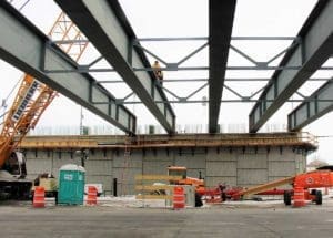 Crews and equipment will work day and night (weather permitting) to complete the construction of the new overpass bridge deck.