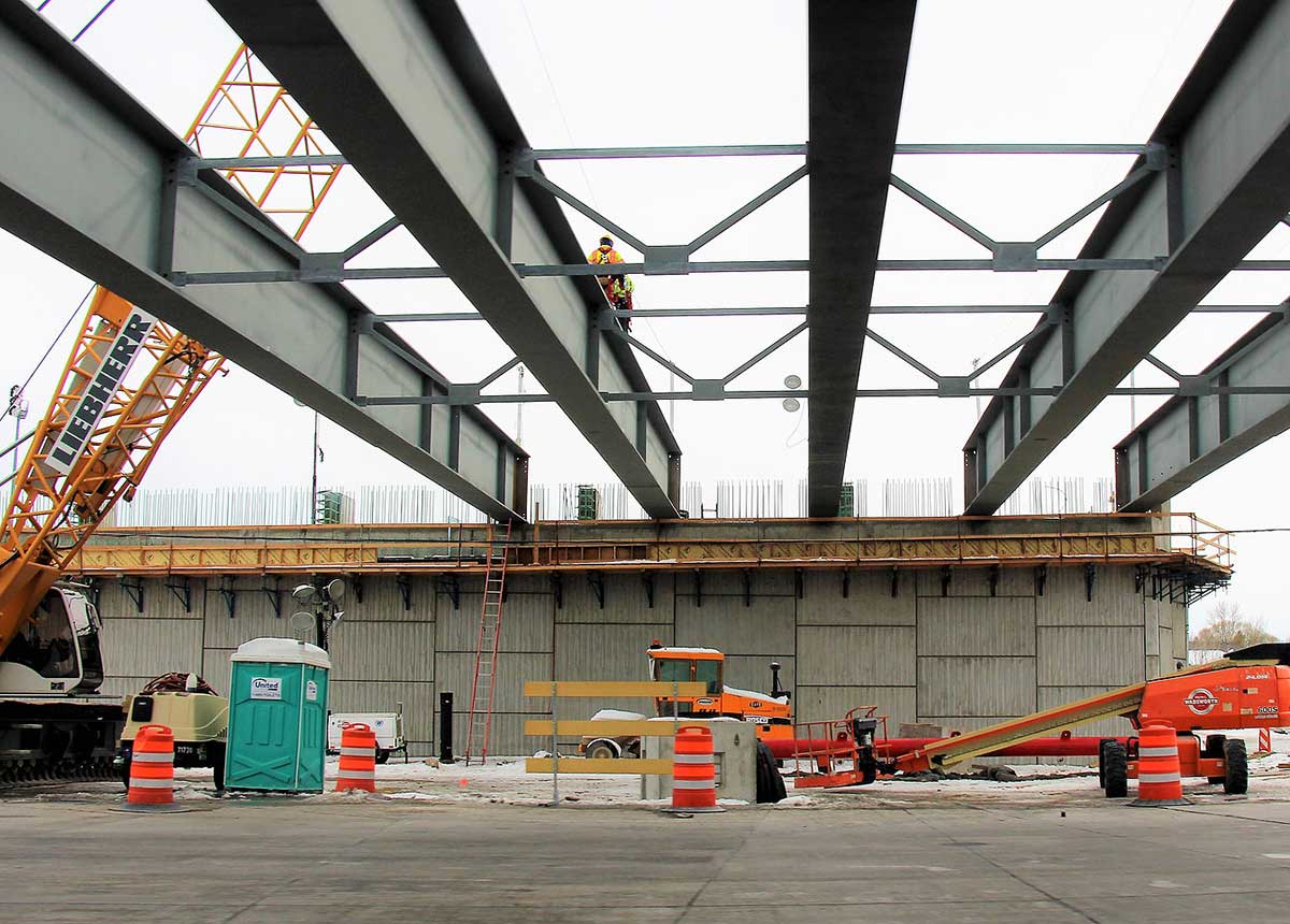 Crews and equipment will work day and night (weather permitting) to complete the construction of the new overpass bridge deck.