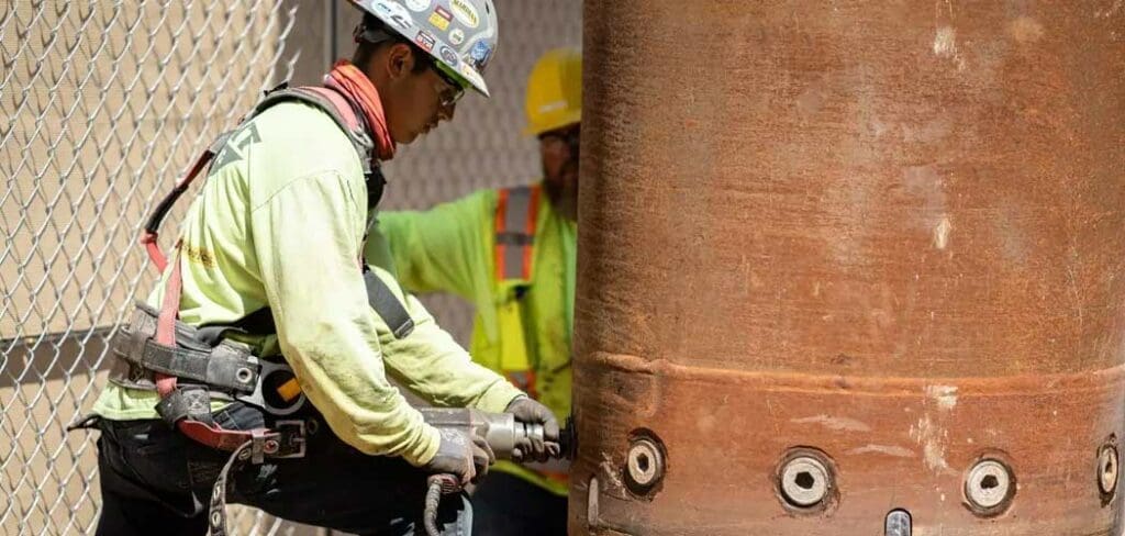 Cased shaft deep foundation drilling