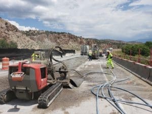 Hydro demolition on bridge repair at I-70