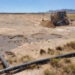 Clearing land with scrapers, dozers and blades for solar panel farm