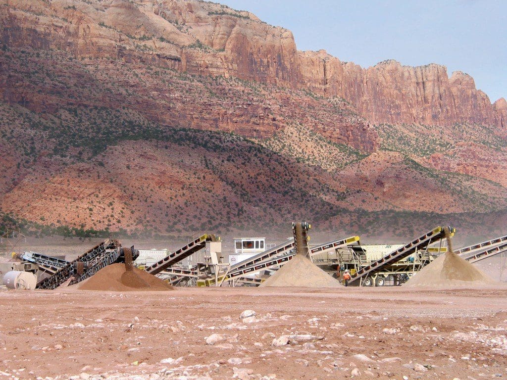 Crushing materials and recycling asphalt and concrete